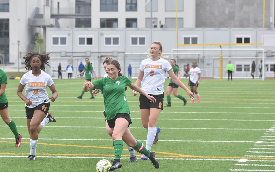 Alconbury's Eleni Politis, who scored three times, sprints through a host of Spangdahlem defenders Tuesday, May 16, 2023, in the Dragons' 4-1 victory on the second day of the DODEA-Europe girls Division III championships at Ramstein Air Base, Germany.