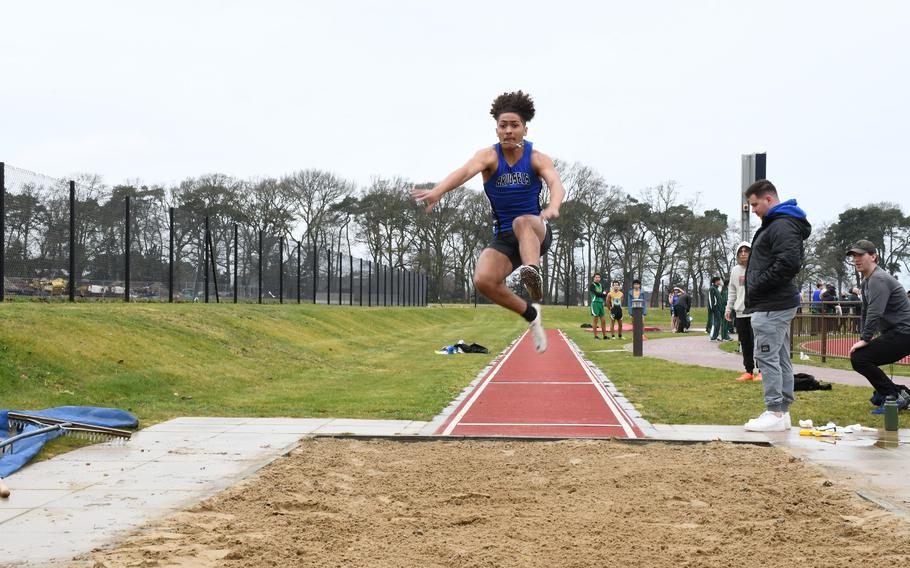 Brussels' Damion Rogers takes a leap during the boys' long jump event on Saturday, March 18, 2023 at RAF Lakenheath High School. 