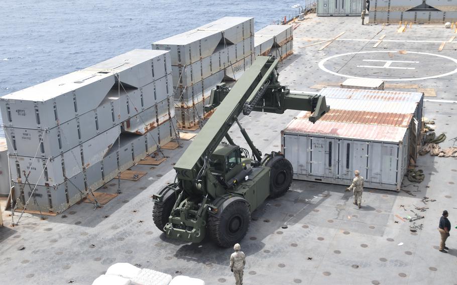 U.S. Army soldiers assigned to the 7th Transportation Brigade (Expeditionary) and sailors attached to the MV Roy P. Benavidez assemble the Roll-On, Roll-Off Distribution Facility (RRDF), or floating pier, off the shore of Gaza in support of Operation Neptune Solace, Friday, April 26, 2024.