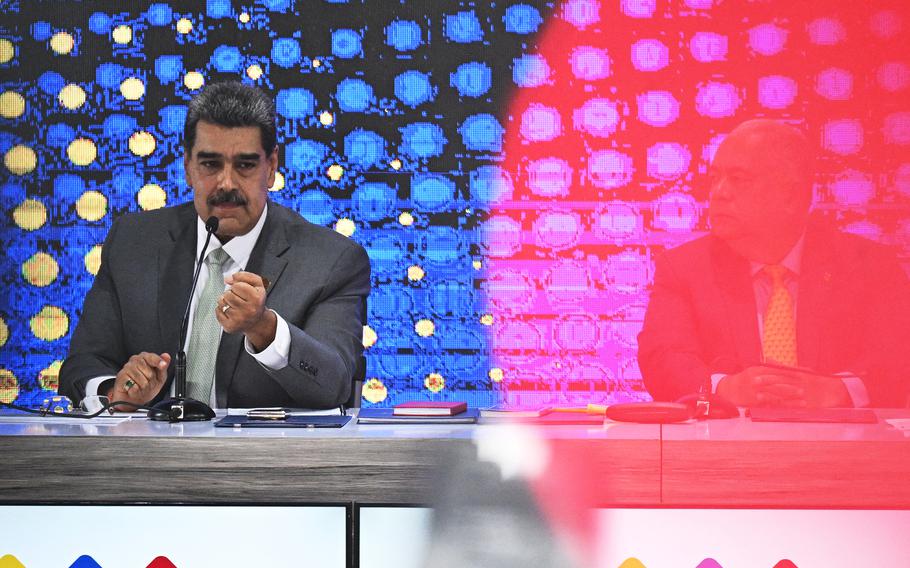 Venezuelan President Nicolas Maduro speaks during a press conference a day after the consultative referendum on Venezuelan sovereignty over the Essequibo region controlled by neighbouring Guyana, at the CNE headquarters in Caracas on Dec. 4, 2023.