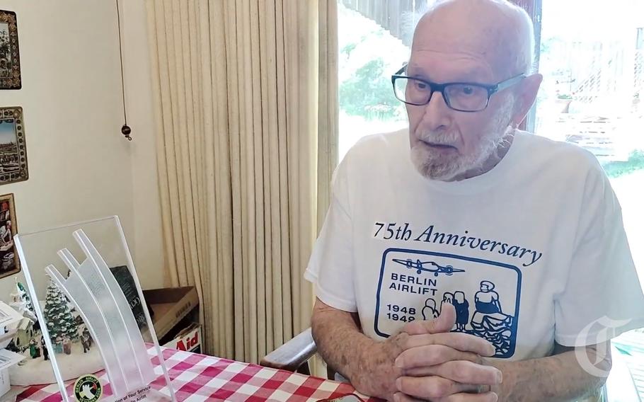 In this screenshot from video, U.S. Army Air Force veteran Emedie “John” Mazzella talks about his experience as a weather observer during the Berlin Airlift.