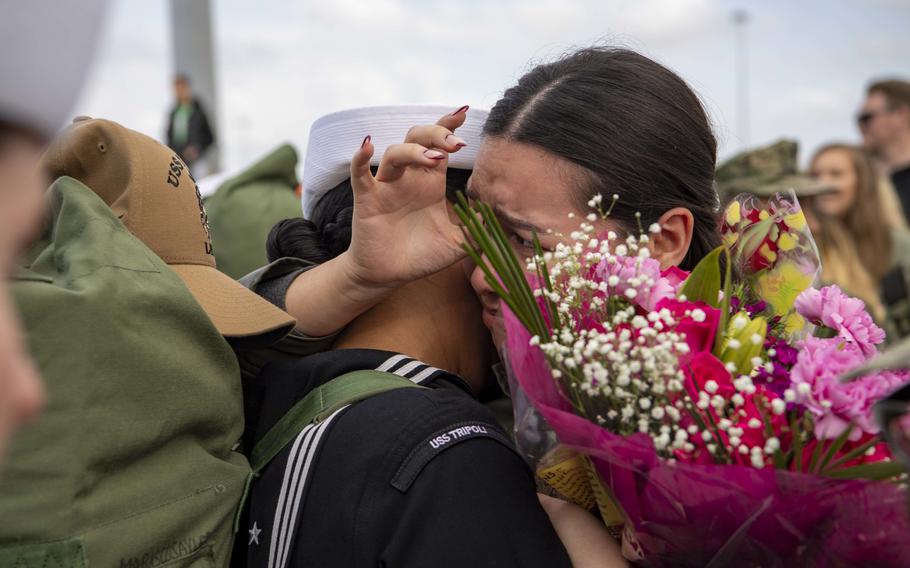 Sailors assigned to amphibious assault carrier USS Tripoli (LHA 7) are reunited with family and friends upon Tripoli’s return to homeport, Tuesday, Nov. 29, 2022.