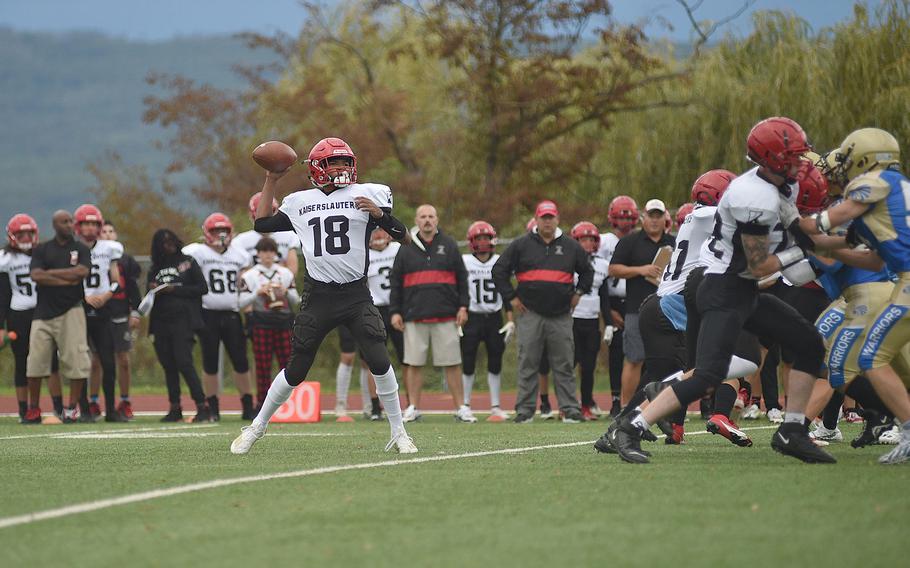 Kaiserslautern quarterback Rueben Todman throws during the Raiders' 44-6 win over the Warriors on Sept. 22, 2023, at Wiesbaden at Wiesbaden High School.