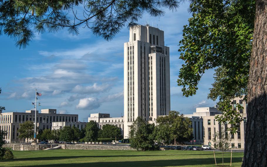 The Walter Reed National Military Medical Center is seen on Aug. 10, 2023, from outside the gated campus in Bethesda, Md. An Army doctor under investigation in a sexual assault case involving at least 23 purported victims has served at a number of military medical facilities including Walter Reed.