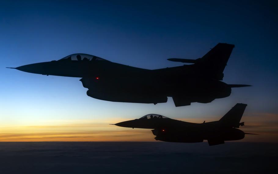 Two U.S. Air Force F-16 Fighting Falcon aircraft, assigned to the 121st Expeditionary Fighter Squadron, fly over U.S. Central Command’s area of responsibility during a mission in support of Combined Joint Task Force — Operation Inherent Resolve, July 17, 2021.