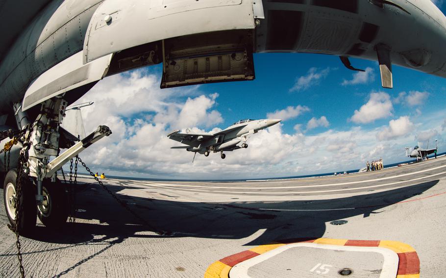 An EA-18G Growler, attached to Electronic Attack Squadron (VAQ) 129, lands on Nimitz-class aircraft carrier USS George Washington (CVN 73) in the Atlantic Ocean, Sept. 10 2023. 