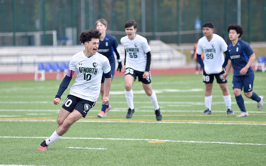 AFNORTH captain Christian Barone celebrates scoring a penalty against Black Forest Academy during a match on April 20, 2024, at Ramstein High School on Ramstein Air Base, Germany.