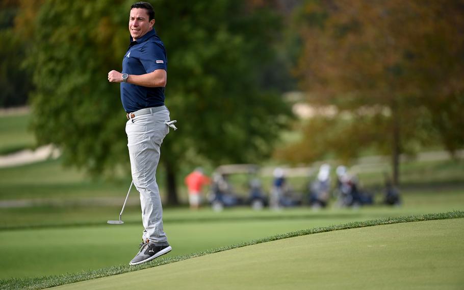 U.S. Army veteran Christopher Cordova reacts to his putt during a PGA Hope event at Congressional Country Club in Bethesda, Md., on Monday, Oct. 17, 2022.