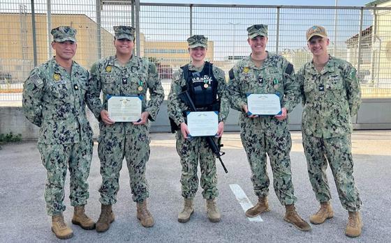 220908-N-DE439-0001 NAPLES, Italy (Sept. 8, 2022) U.S. Naval Support Activity (NSA) Naples Commanding Officer Capt. James Stewart (far right), poses for a photo with Navy and Marine Corps Commendation Medal recipients in Capodichino, Italy, Sept. 8, 2022. NSA Naples is an operational ashore base that enables U.S., allied, and partner nation forces to be where they are needed, when they are needed to ensure security and stability in the European, African, and Central Command areas of responsibility. (U.S. Navy photo by Mass Communication Specialist 2nd Class Almagissel Schuring)