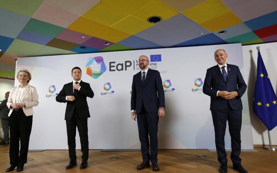 Ursula von der Leyen, president of the European Commission, left, Volodymyr Zelenskyy, Ukraine’s prime minister, second left, Charles Michel, president of the European Council, third left, and Janez Jansa, Slovenia’s prime minister, pose for a photo on the sidelines of the Eastern Partnership Summit at the Europa building in Brussels on Dec. 15, 2021. 