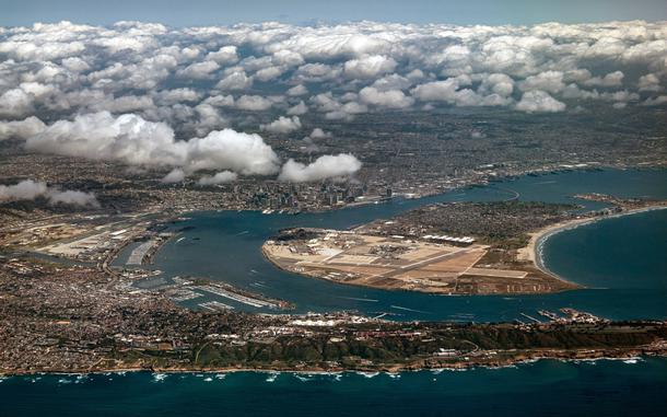 Clouds cleared out along the San Diego coastline after a morning drizzle on Tuesday, March 26, 2024. Point Loma is seen in the foreground, along with San Diego Bay and Coronado. (K.C. Alfred/The San Diego Union-Tribune/TNS)