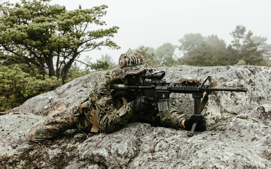 U.S. Marine Lance Cpl. Jaxson Caison takes up a position during exercise Archipelago Endeavor 23 in Sweden on Sept. 11, 2023.