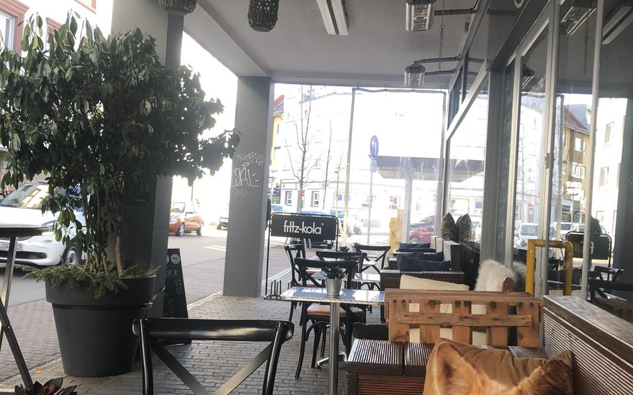 Outdoor tables in front of It's Me cafe in downtown Kaiserslautern, Germany, on April 11, 2022.