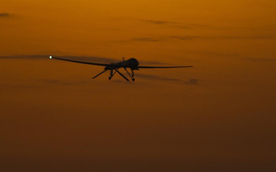 An MQ-9 Reaper departs on a night mission from Kandahar Airfield, Afghanistan, Dec. 27, 2009. U.S. counterterrorism efforts over Afghanistan now involve unmanned aircraft launched from Qatar, according to a Defense Department Inspector General report released May 17, 2022.