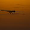 An MQ-9 Reaper departs on a night mission from Kandahar Airfield, Afghanistan, Dec. 27, 2009. U.S. counterterrorism efforts over Afghanistan now involve unmanned aircraft launched from Qatar, according to a Defense Department Inspector General report released May 17, 2022.