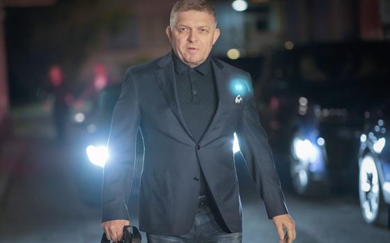 Former Prime Minister Robert Fico arrives to his party's headquarters after polling stations closed for an early parliamentary election, in Bratislava, Slovakia, Saturday, Sept. 30, 2023.