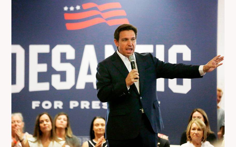 Florida governor, and U.S. presidential hopeful, Ron DeSantis talks to a crowd Monday in Tega Cay, S.C.