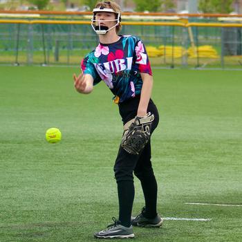 Kubasaki right-hander Taryn Lockhart delivers during Monday's Far East Division I softball tournament game. The Dragons won one game and tied another.