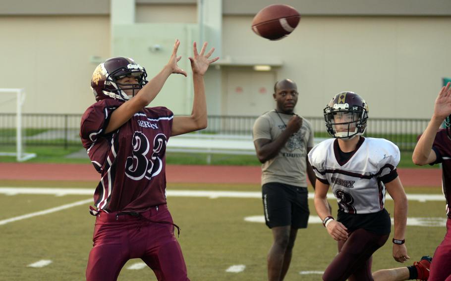 Joshua Rodriguez looks to catch the ball.