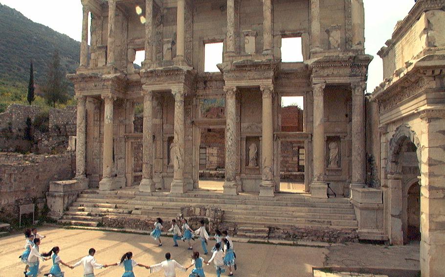 Young folk dancers circle in front of the Library of Celsus at Turkey's ancient city of Ephesus. U.S. European Command is updating its travel requirements for Turkey for Defense Department personnel and command-sponsored family members, making it again possible to tour the country's sites. 