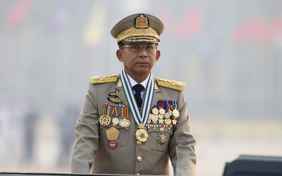 Myanmar's Commander-in-Chief Senior General Min Aung Hlaing presides an army parade on Armed Forces Day in Naypyitaw, Myanmar, Saturday, March 27, 2021. The army takeover in Myanmar a year ago that ousted the elected government of Aung San Suu Kyi brought a shocking end to the effort to restore democratic rule in the Southeast Asian country after decades of military rule.