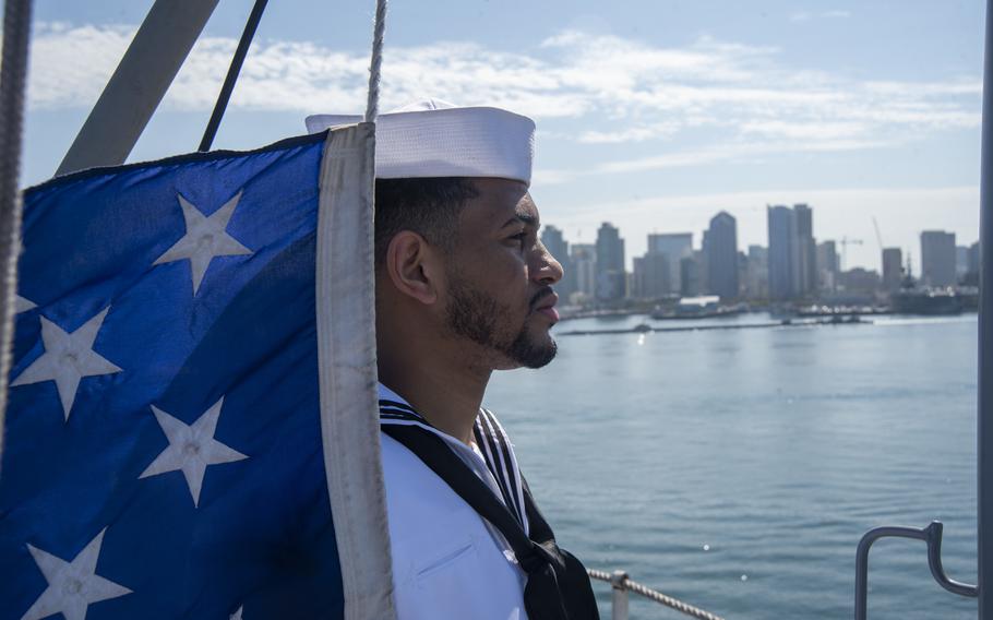 Seaman Williams Rodriguez stands on the flight deck aboard the USS Nimitz in San Diego, July 18, 2022. Sailors aboard the Nimitz in September reported irregularities in the ships water supply and later identified trace amounts of jet fuel in the ship’s water while it was off the coast of Southern California. 