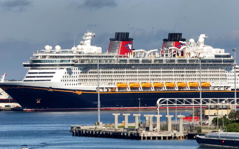 Disney Cruise Line’s ‘Dream’ is docked in Port Canaveral, Friday, July 30, 2021. Disney Cruise Line is the latest to shift policy to now require passengers 12 and older to be vaccinated against COVID-19.