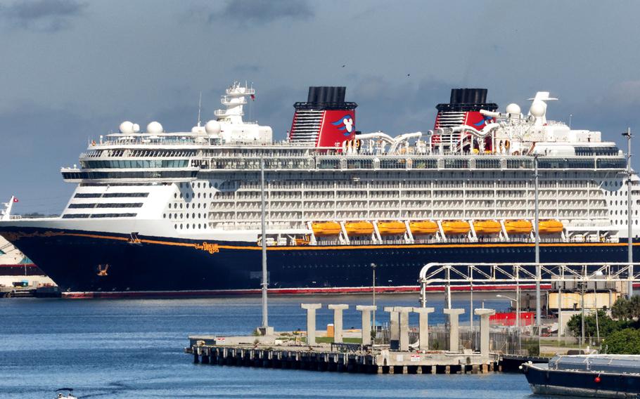 Disney Cruise Line’s ‘Dream’ is docked in Port Canaveral, Friday, July 30, 2021. Disney Cruise Line is the latest to shift policy to now require passengers 12 and older to be vaccinated against COVID-19.