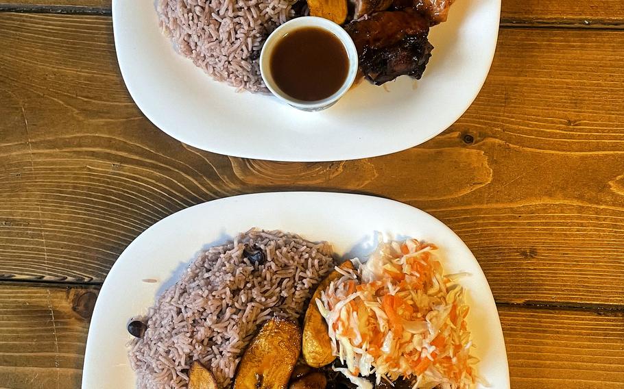 The jerk chicken plate, top, and oxtail stew, as served at Bickles Jamaican Grill in Frankfurt, Germany.