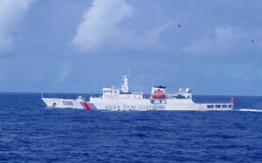 Japan says China coast guard vessel 1305, seen here in August 2019, appeared to be armed with a deck-mounted machine gun when it entered Japanese territory near the Senkaku Islands, Thursday, March 30, 2023.