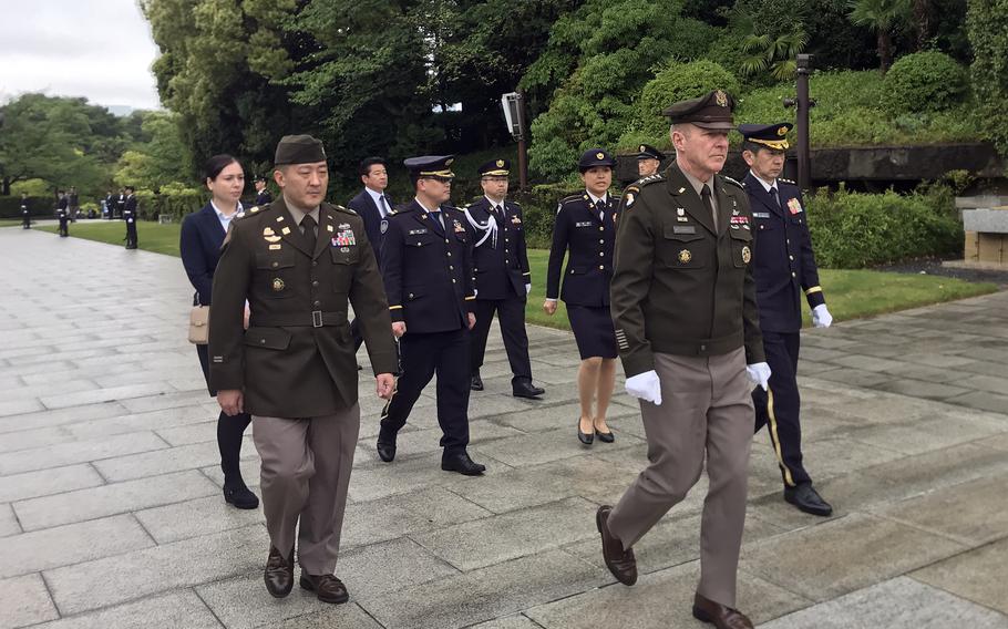 U.S. Army Chief of Staff Gen. James McConville visits a memorial for fallen Japanese soldiers at Camp Ichigaya in Tokyo, May 8, 2023.