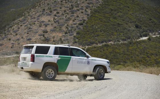 San Diego, California - June 08: United States Border Patrol tours an area where larger number of noncitizens are making multiple border crossing attempts. A Border Patrol SUV drives off on a road at Otay Mountain on Tuesday, June 8, 2021 in San Diego, California (Alejandro Tamayo / The San Diego Union-Tribune)