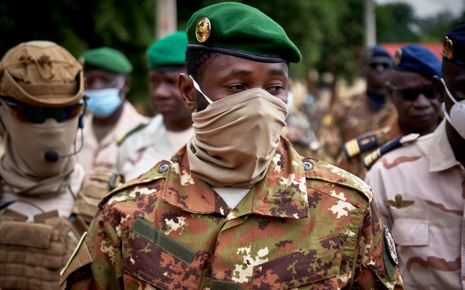 Col. Assimi Goita, president of the CNSP (National Committee for the Salvation of the People), arrives at the funeral of former Mali President General Moussa Traore in Bamako on Sept. 18, 2020. 