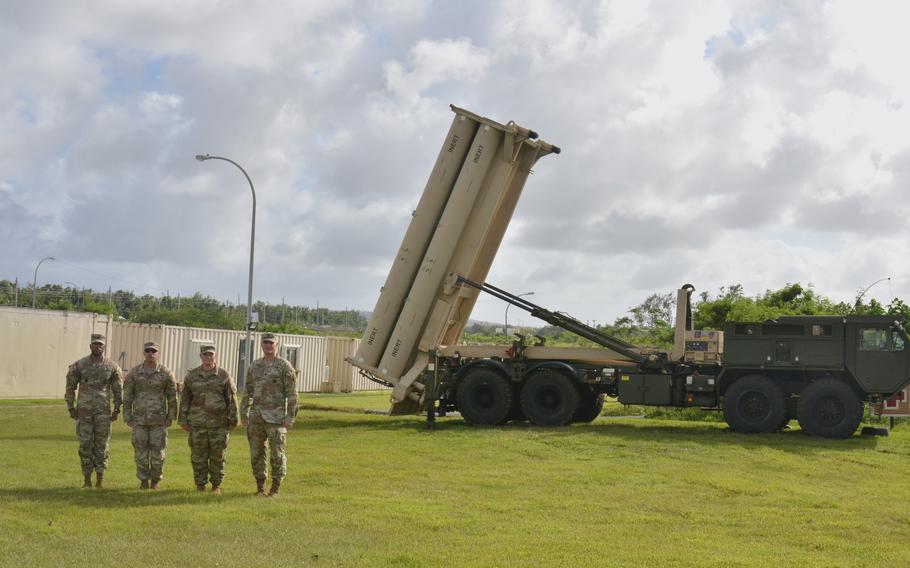 
Task Force Talon members, from left, Master Sgt. Ayinde Waverly, Master Sgt. Steven Smith and Capt. Riley Campbell and unit commander Lt. Col. Jonathan Stafford stand near a Terminal High Altitude Area Defense, or THAAD, launcher at Site Excalibur, Guam, on Nov. 30.