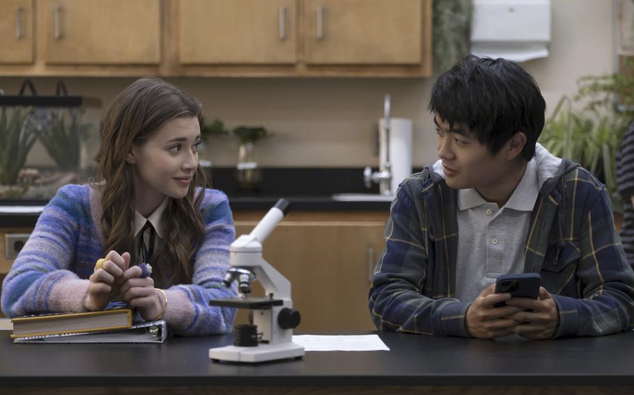 Sydney Taylor, left, and Ben Wang appear in a scene from “American Born Chinese.” Wang plays the main character, high school soccer player Jin, who is growing up amid pressure to reconcile his American and Chinese sides.