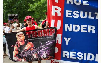 Supporters of former President Donald Trump attend a campaign rally at Crotona Park in the South Bronx on Thursday, May 23, 2024, in New York. 
