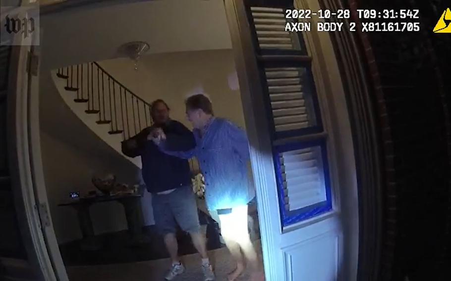 This screenshot from police body-camera footage released on Jan. 27 shows the moment David DePape severely injured Paul Pelosi during an October 2022 attack inside Pelosi’s home.