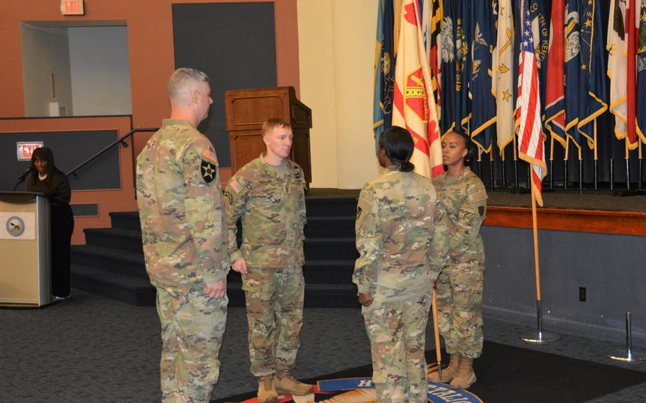 Command Sgt. Maj. Daniel Hopkins assumes responsibility for the Headquarters Battalion at Fort Belvoir, Va., from Command Sgt. Maj. Michel Fraser, Friday, June 10, 2022.