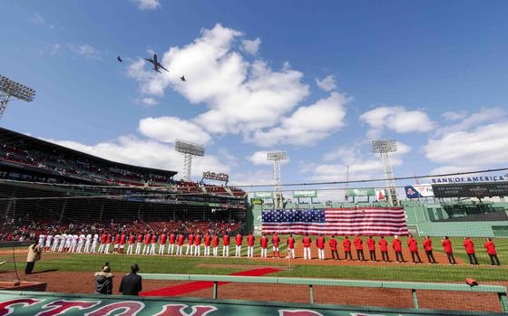 An F-35A Lightning II assigned to the Vermont Air National Guard joins a KC-46 Pegasus assigned to Pease Air National Guard and an F-15 Eagle assigned to Barnes Air National Guard for a flyover tribute during the Boston Red Sox 2021 season home opener at Fenway Park, Boston, MA, April 2, 2021. (U.S. Air National Guard photo by Mrs. Julie M. Paroline)