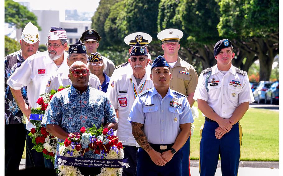 Members of the Defense POW/MIA Accounting Agency participate in a ceremony for National POW/MIA Recognition Day at the National Memorial Cemetery of the Pacific, Honolulu, Sept. 15, 2023. 