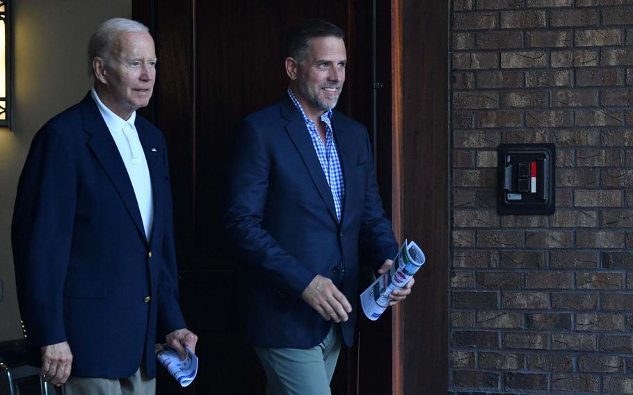 President Joe Biden, left, alongside his son Hunter Biden exit Holy Spirit Catholic Church after attending mass in Johns Island, South Carolina, on Aug. 13, 2022.