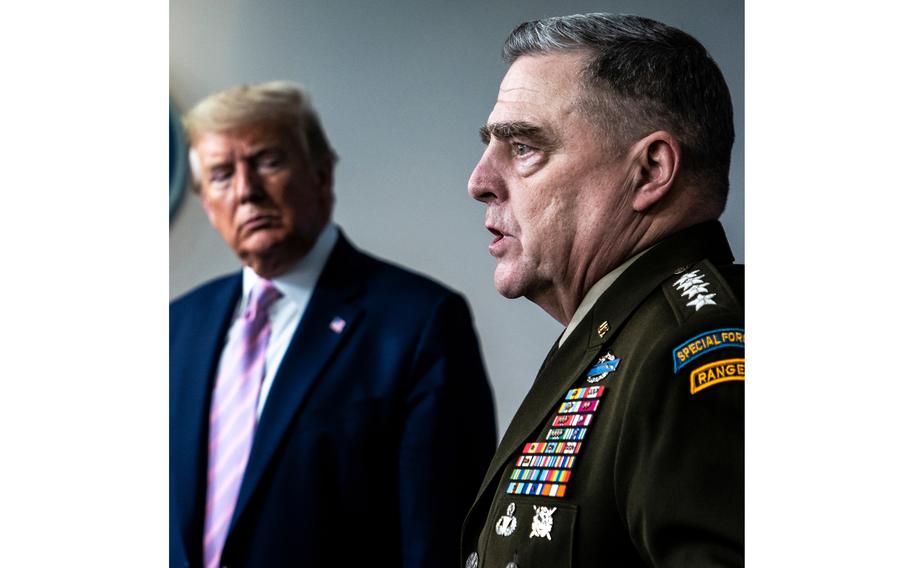 President Donald Trump listens to Gen. Mark A. Milley, the chairman of the Joint Chiefs of Staff, at the White House on April 1, 2020. 