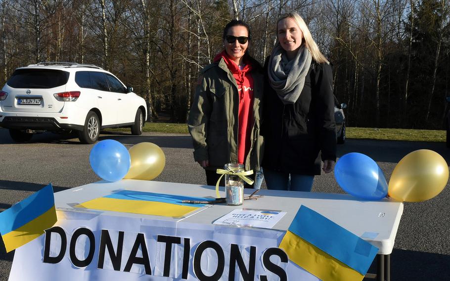 Evgeniya Cole, left, and Anya Douglas, Ukrainians married to Americans in the Kaiserslautern military community, help organize a donation drive for people in need in Ukraine, March 4, 2022.
