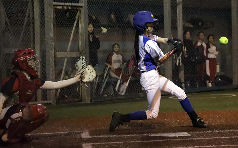 Erica Haas swings.