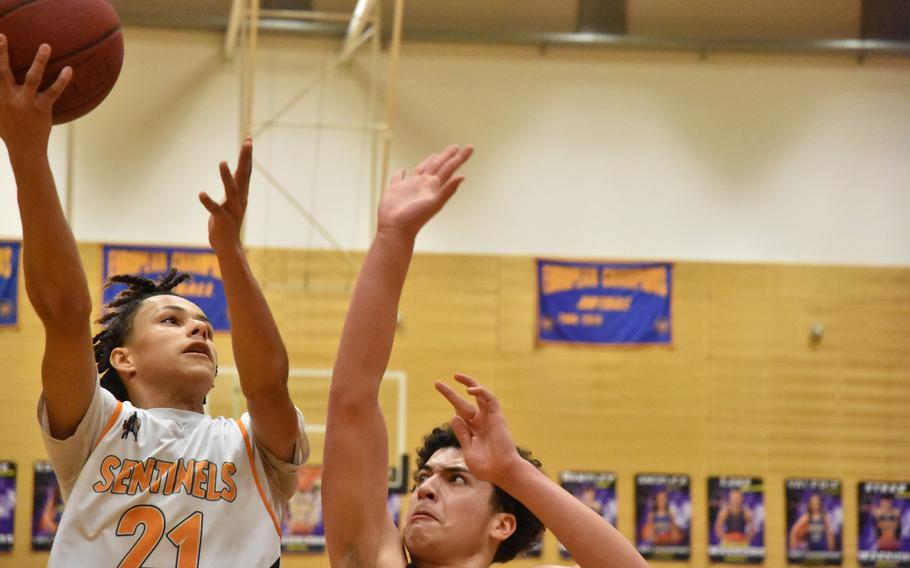 Spangdahlem’s Cameron Lewis goes up for a shot in the Sentinels’ Division III semifinal victory over Baumholder in the DODEA European Basketball Championships in Wiesbaden, Germany, on Friday, Feb. 16, 2024.