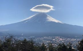 Mount Fuji and the city of Fujiyoshida are pictured on Dec. 12, 2021. 