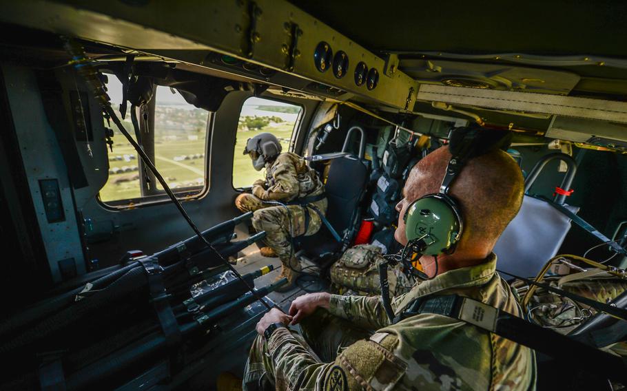 Army Brig. Gen. Clinton Murray, commanding general of Medical Readiness Command, Europe, and command surgeon, gets an aerial view of a medical field hospital along the Danube River near Bordusani, Romania, on June 6, 2023. Murray also assumed the role of a patient and received mock trauma treatment in two field hospitals during a medical evacuation simulation Wednesday.