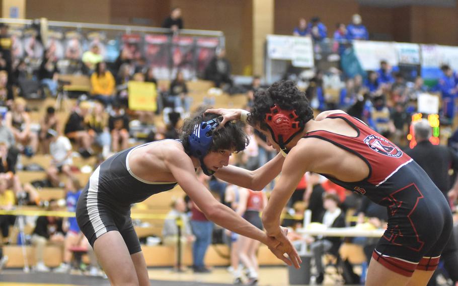 Rota’s Leo McFarland, left, and Kaiserslautern’s Jaden Calixto get grabby at 106 pounds Friday, Feb. 9, 2024, at the DODEA European Wrestling Championships in Wiesbaden, Germany. Calixto won the match.