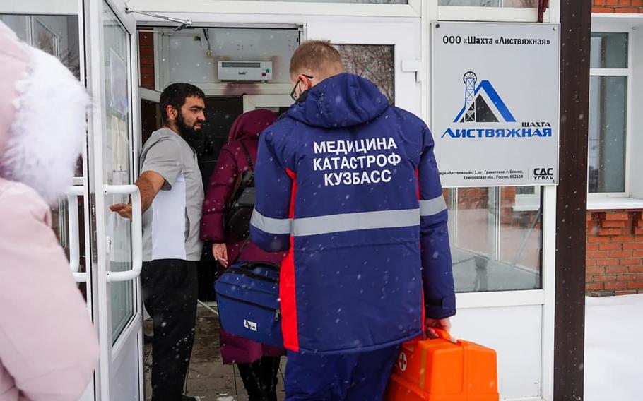 Rescuers enter a checkpoint of the Listvyazhnaya coal mine out of the Siberian city of Kemerovo, about 3,000 kilometres (1,900 miles) east of Moscow, Russia, Thursday, Nov. 25, 2021. A fire at a coal mine in Russia’s Siberia killed 11 people and injured more than 40 others on Thursday, with dozens of others still trapped, authorities said.