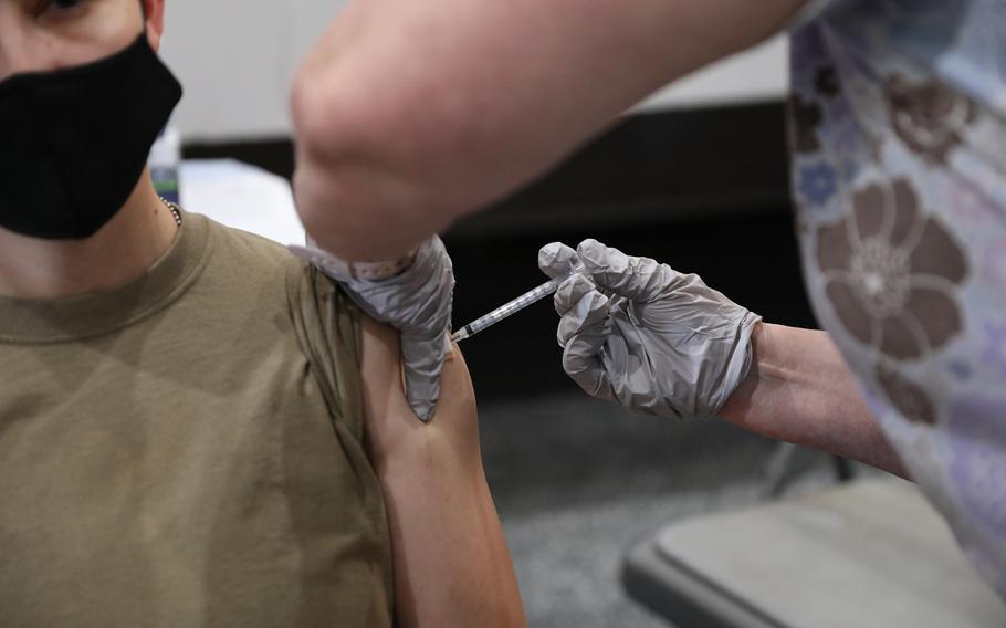 A U.S. Army sergeant receives the COVID-19 vaccination at Stayton Theater, at Fort Bliss, Texas, Feb. 5, 2021. 